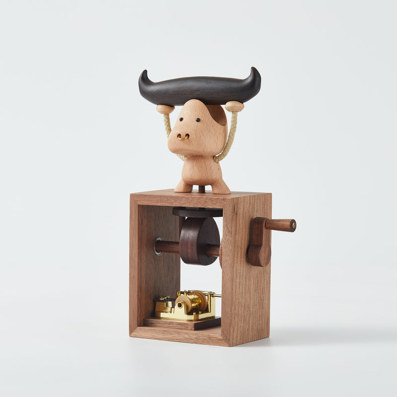 CraftsWP Hand-Crafted Wooden Music Box with Cow Weightlifting Design: A Magical Melody in Your Hand