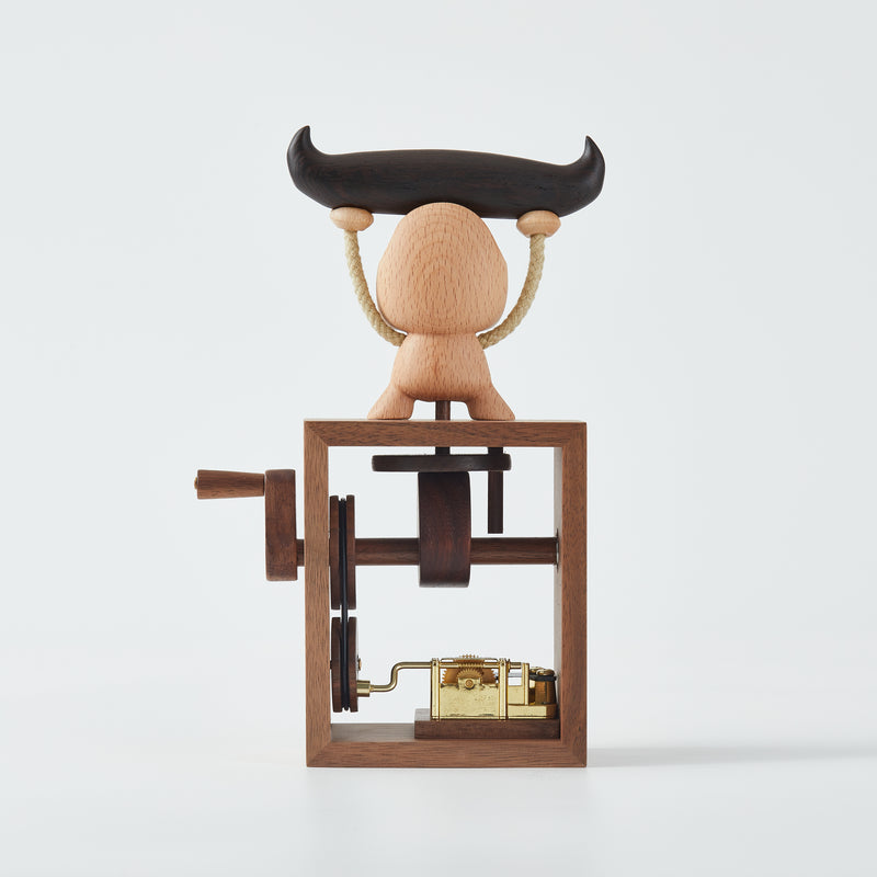 CraftsWP Hand-Crafted Wooden Music Box with Cow Weightlifting Design: A Magical Melody in Your Hand